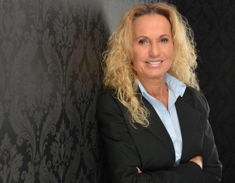 Porträt von Karin Busz, Immobilien-Expertin und Geschäftsführerin